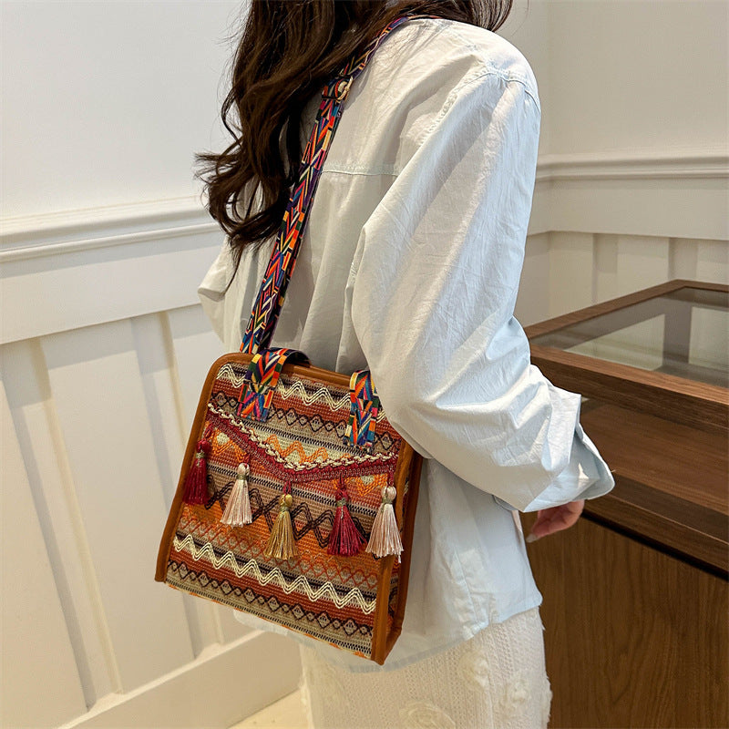 Ethnic style crossbody wide shoulder strap tassel bucket bag