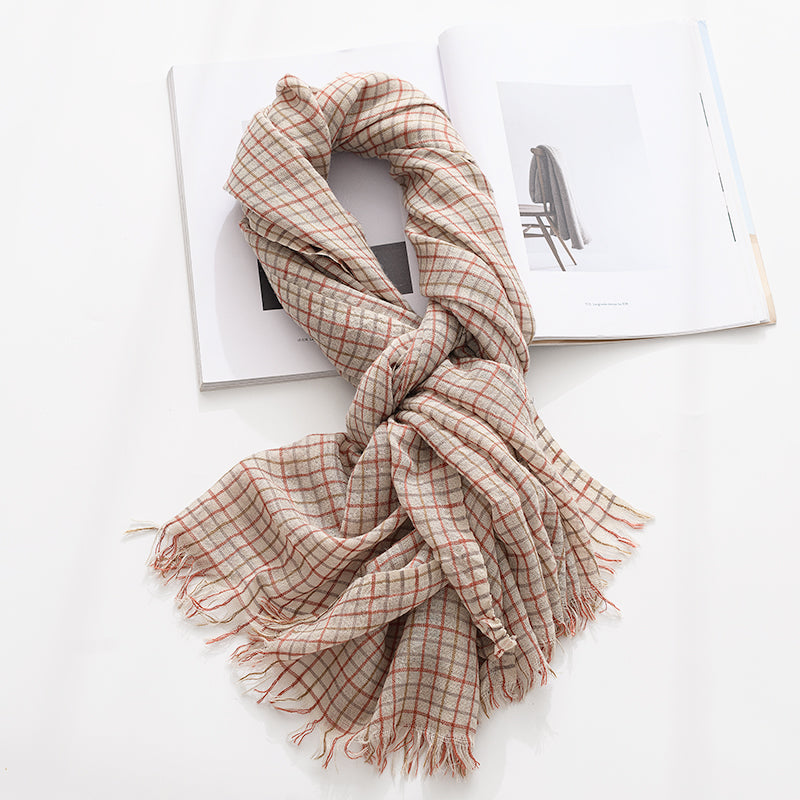 Plaid scarf is a classic and versatile spring and autumn thin shawl that can be used for winter fashion to show your temperament.