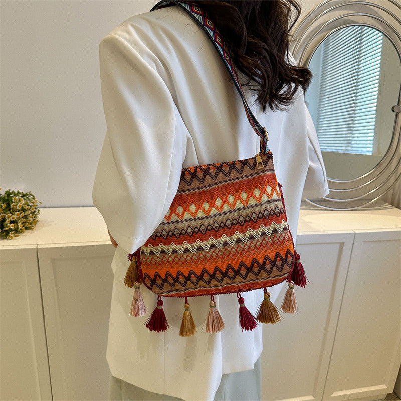 Ethnic style bag crossbody versatile wide shoulder strap travel wear bag tassel bucket bag