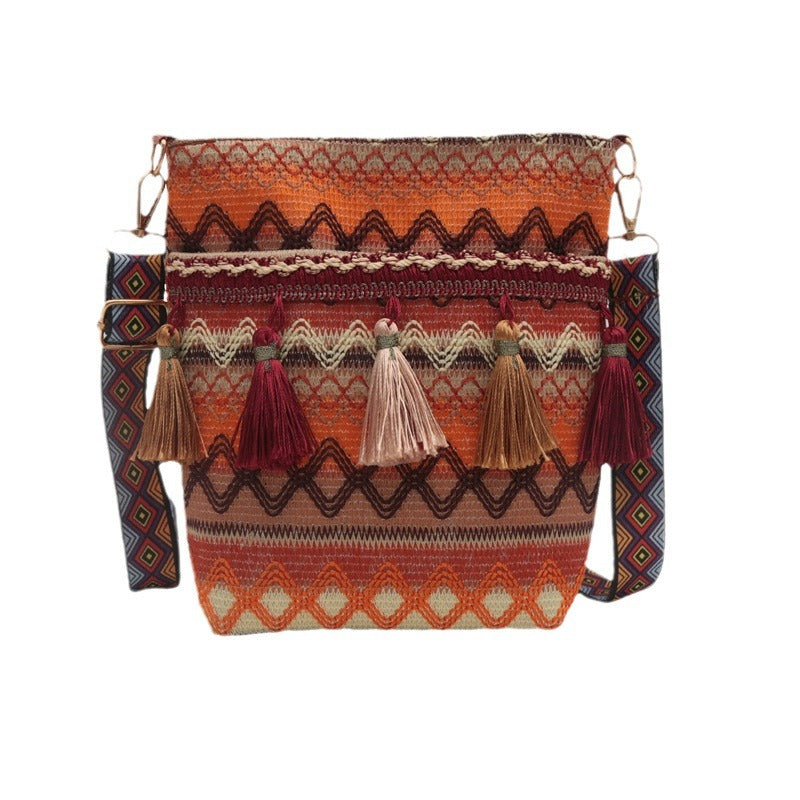 Exquisite textured small bag, new ethnic style tassel bag, cross-body mobile phone bag